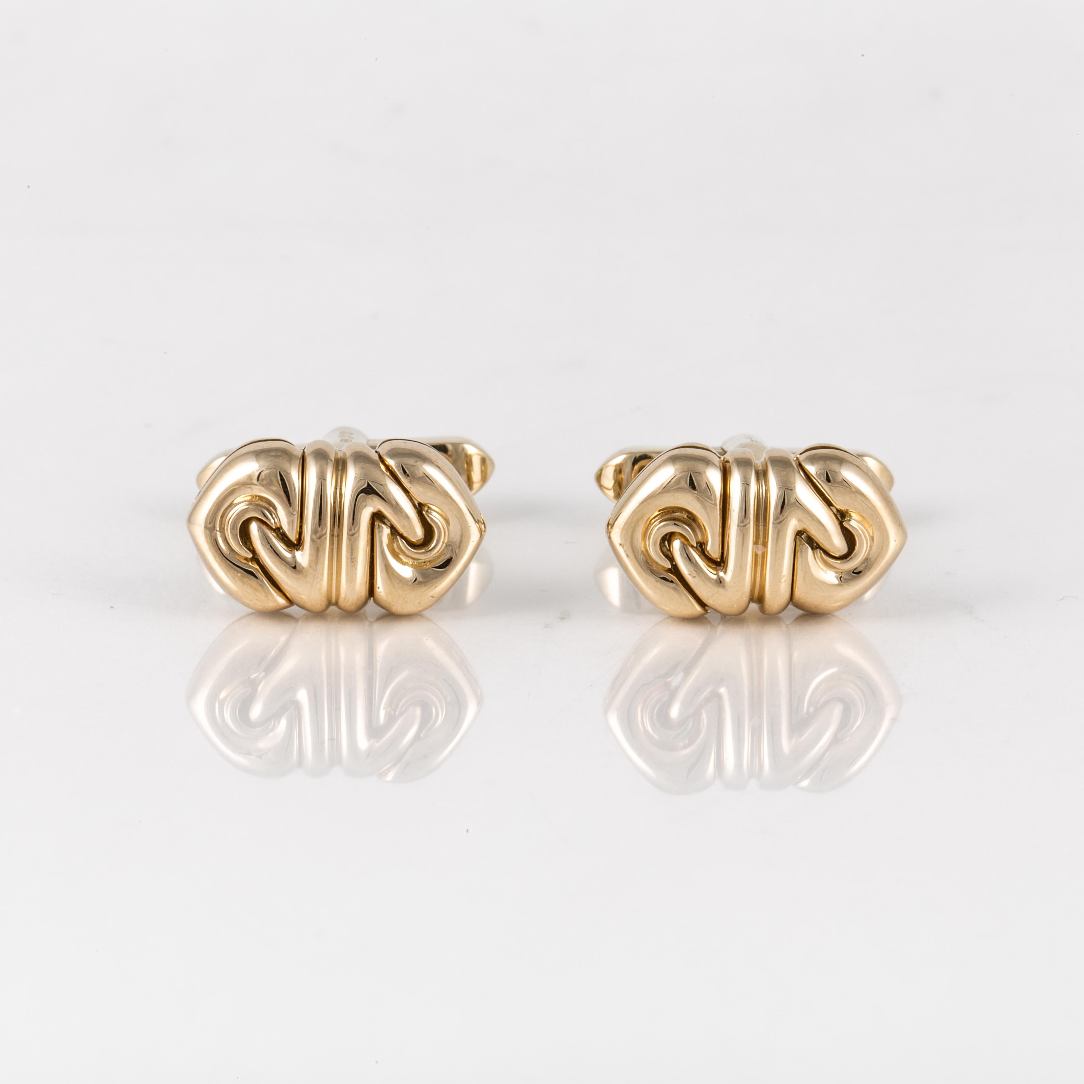  Bulgari Doppio Cuore 18K yellow gold cufflinks.  They measure 3/4 inches long and 3/8 inches wide.  