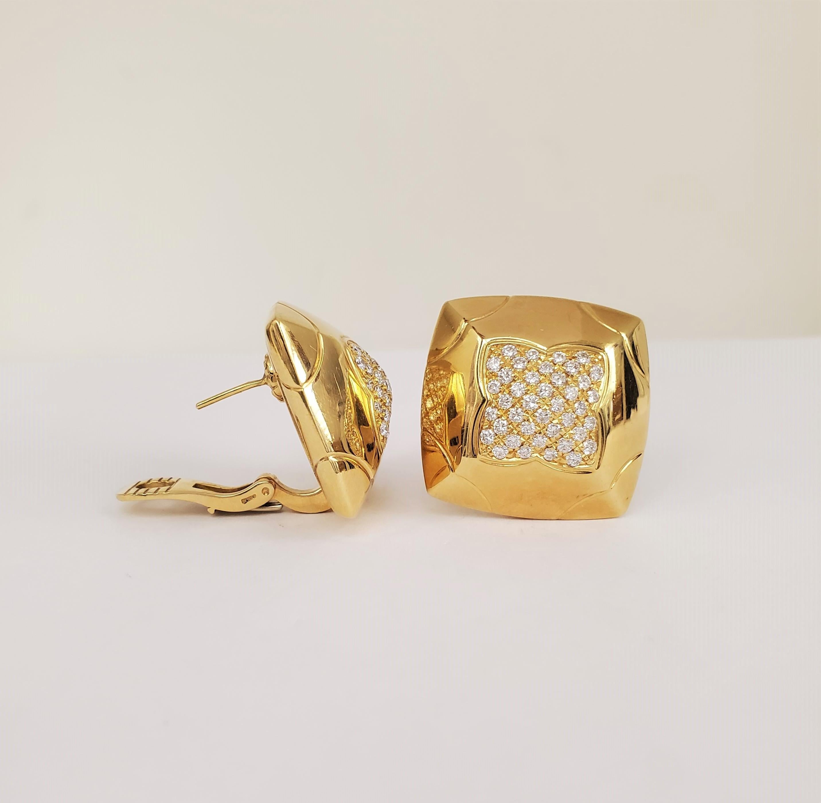 Authentic Bulgari Pyramide earrings crafted in 18 karat yellow gold with approximately 80 diamonds, weighing an estimated 1.6 cttw.  Earrings measure 1 inch x 1 inch.  Signed Bulgari, 750.  CIRCA 2000s