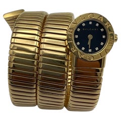 Bulgari Montre-bracelet Serpenti Tubogas enveloppante en or jaune avec diamants