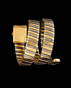 Bulgari Gelbgold Edelstahl Serpenti Tubogas Armbanduhr, um 1970