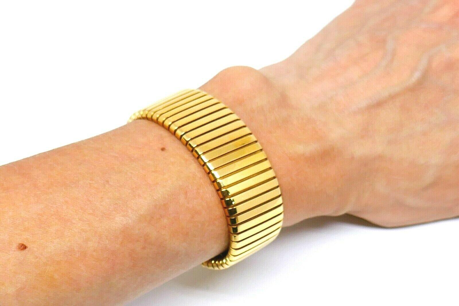 This wide Tubogas cuff from Bulgari is a shiny statement in its simplicity and boldness. You will  wear it every day and never get tired of it. With this bracelet you have flawless Bulgari workmanship, comfortable wearing and iconic Tubogas design
