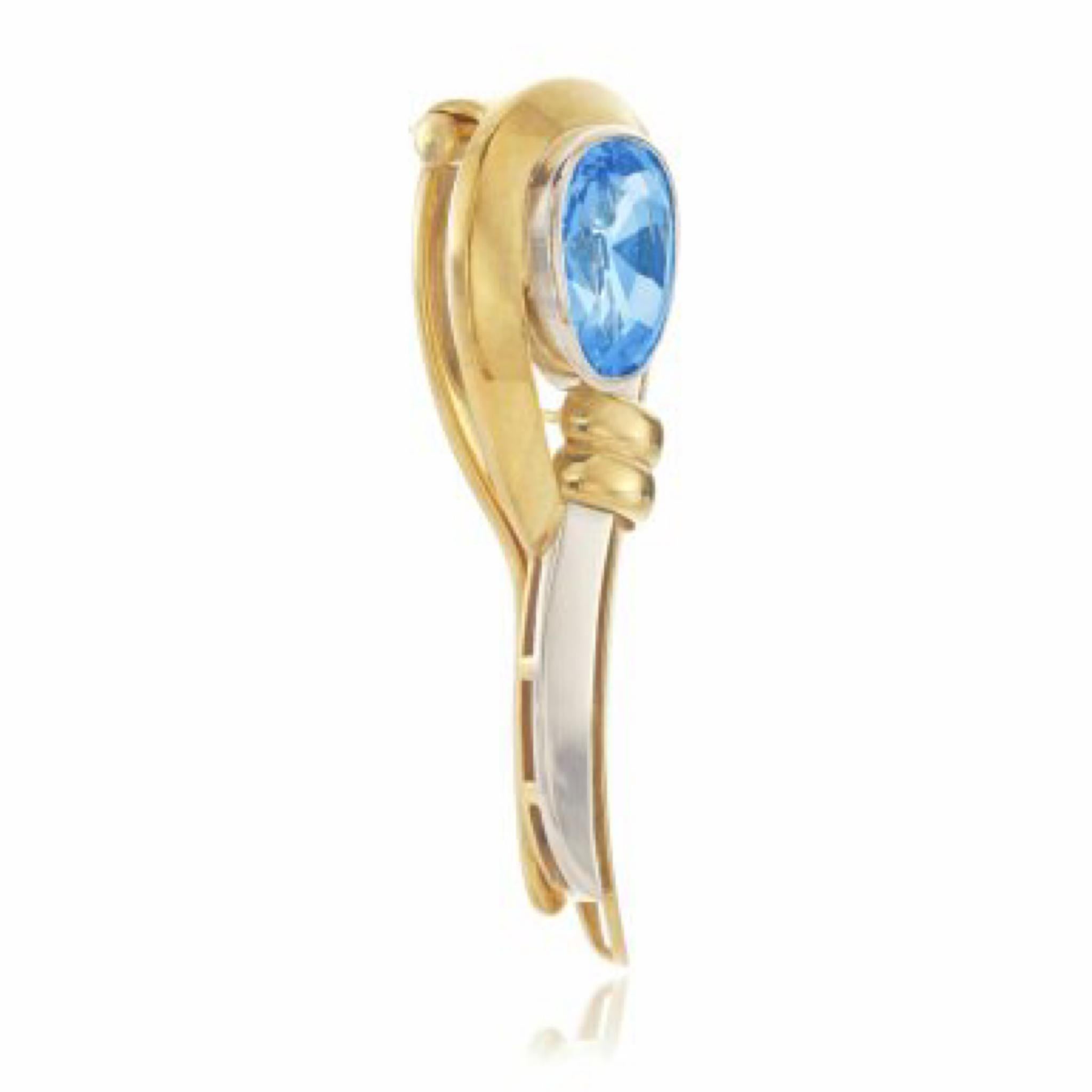 FROM THE COLLECTION OF PRINCESS EUDOXIA OF BULGARIA (1898-1985)

Sapphire and gold clip, 1930s
Of scroll design, collet-set with a pear-shaped sapphire, maker's mark. Stamped 585 for 14 carat gold.
Measuring approximately 45 x 15mm. Gross weight