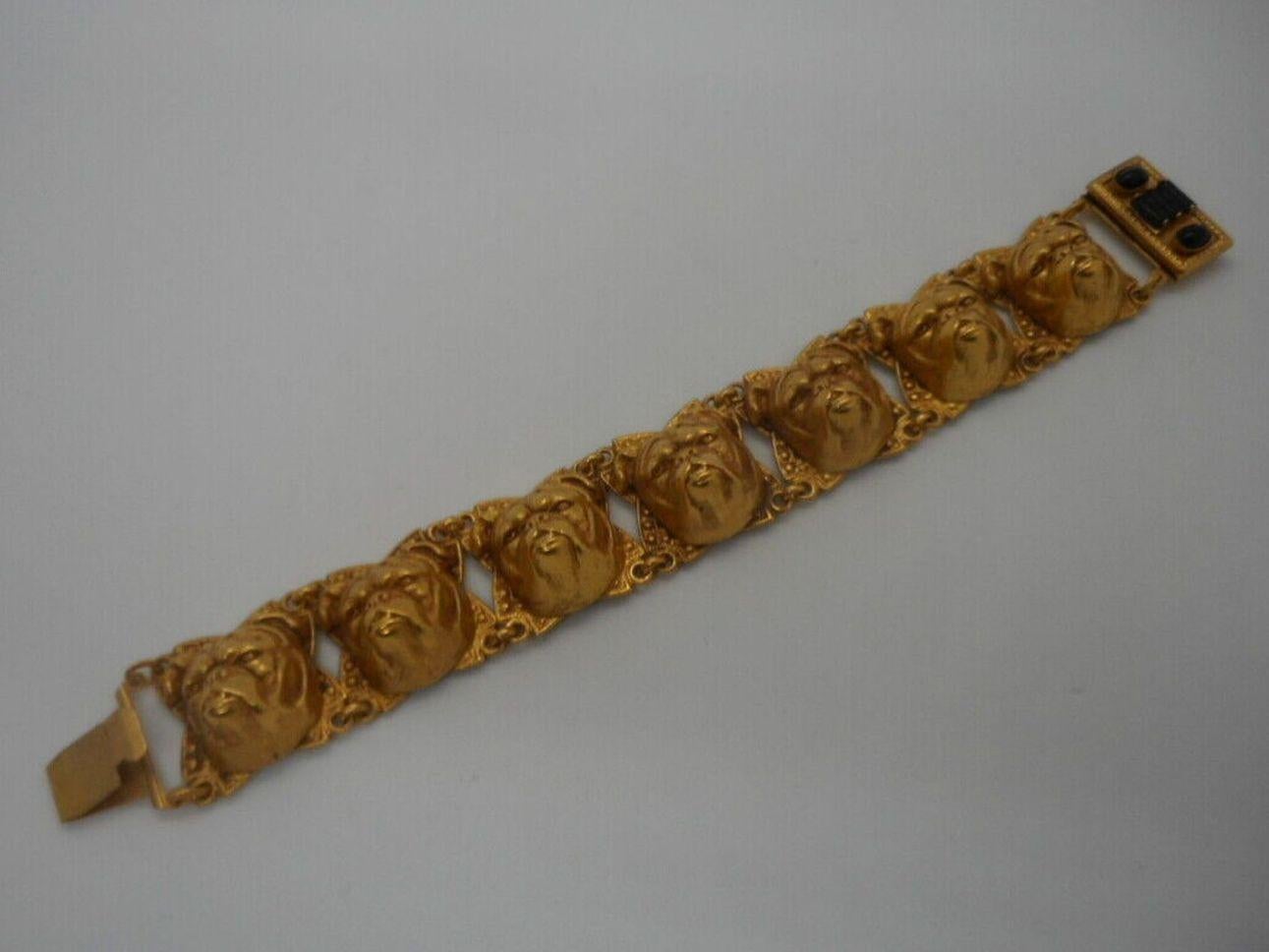 Simply Fabulous! Askew London Signed Bulldog Head Link Bracelet. Antiqued Gold plated ornate Brass bases set with Gilt Brass Bulldog Heads. Bracelet has a wide push-in fastening. Bracelet measures 7.50'' long X 1.00'' wide.  More Beautiful in real