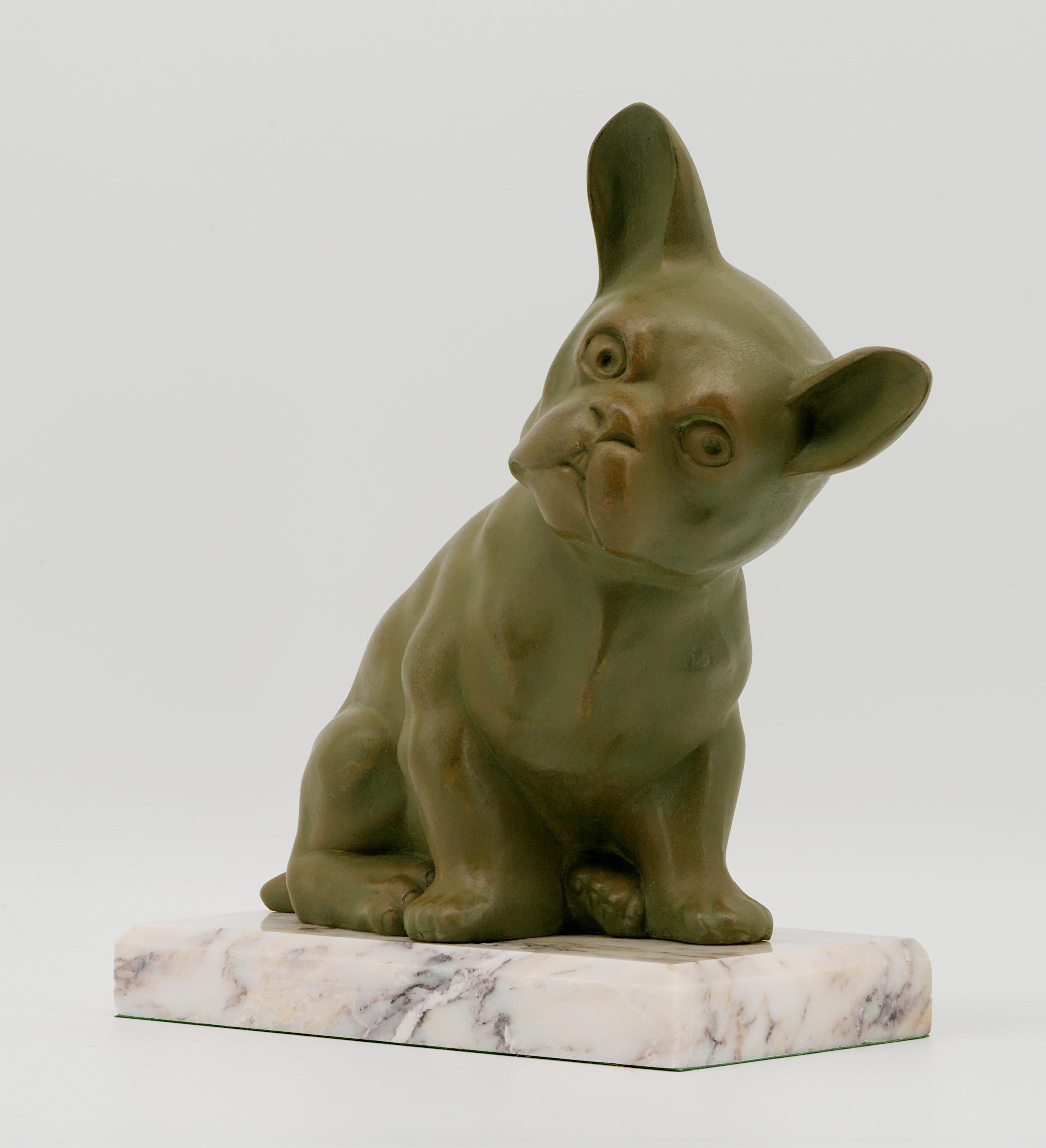 French Art Deco French Bulldog Sculpture, France, ca. 1920. This charming French Art Deco sculpture, created around 1925, depicts a French Bulldog in a stylized and elegant manner. Made of spelter and mounted on a marble base, the sculpture