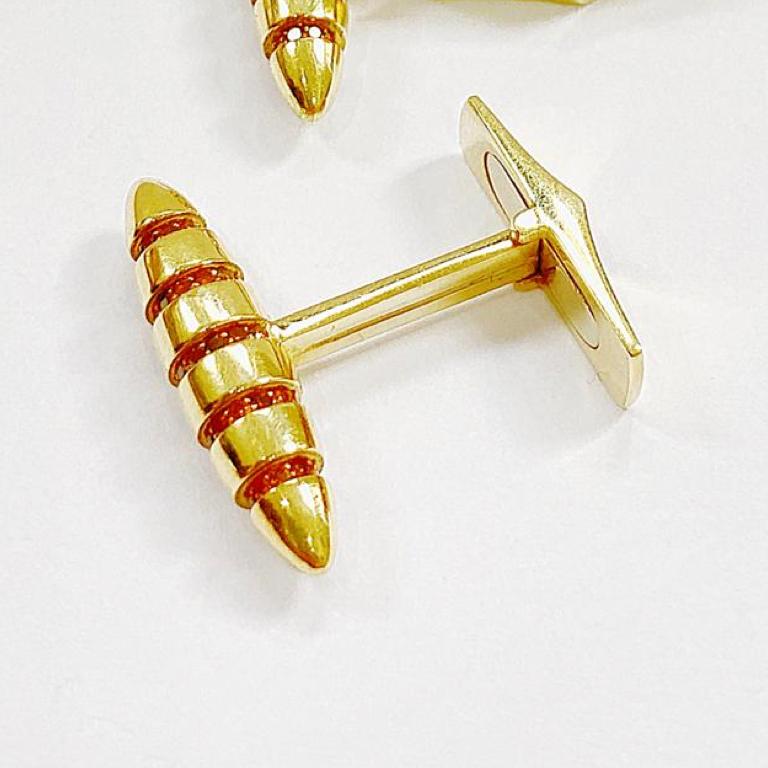 Stunning 18 carat yellow gold bullet cufflinks in mandarin coloured diamonds. 

Esther Eyre has been designing and making precious jewellery for over twenty years. She trained at Kingston and Middlesex gaining a BA in jewellery design in 1982.