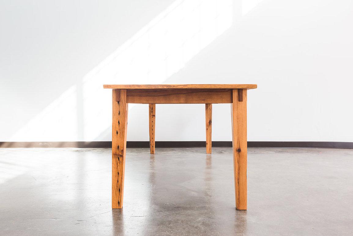 Our first design, the bullet table received it's name when we found an antique fired round inside one of the oak boards we were milling. Featuring a classic tapered leg, the table is traditionally shaker, but we gave it a bit of craftsman's flair