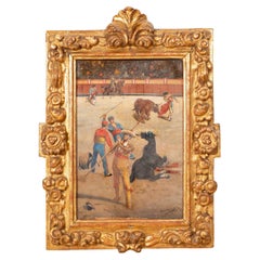 Vintage “Bullfighting scene”. Oil on panel, carved and gilded wooden frame.