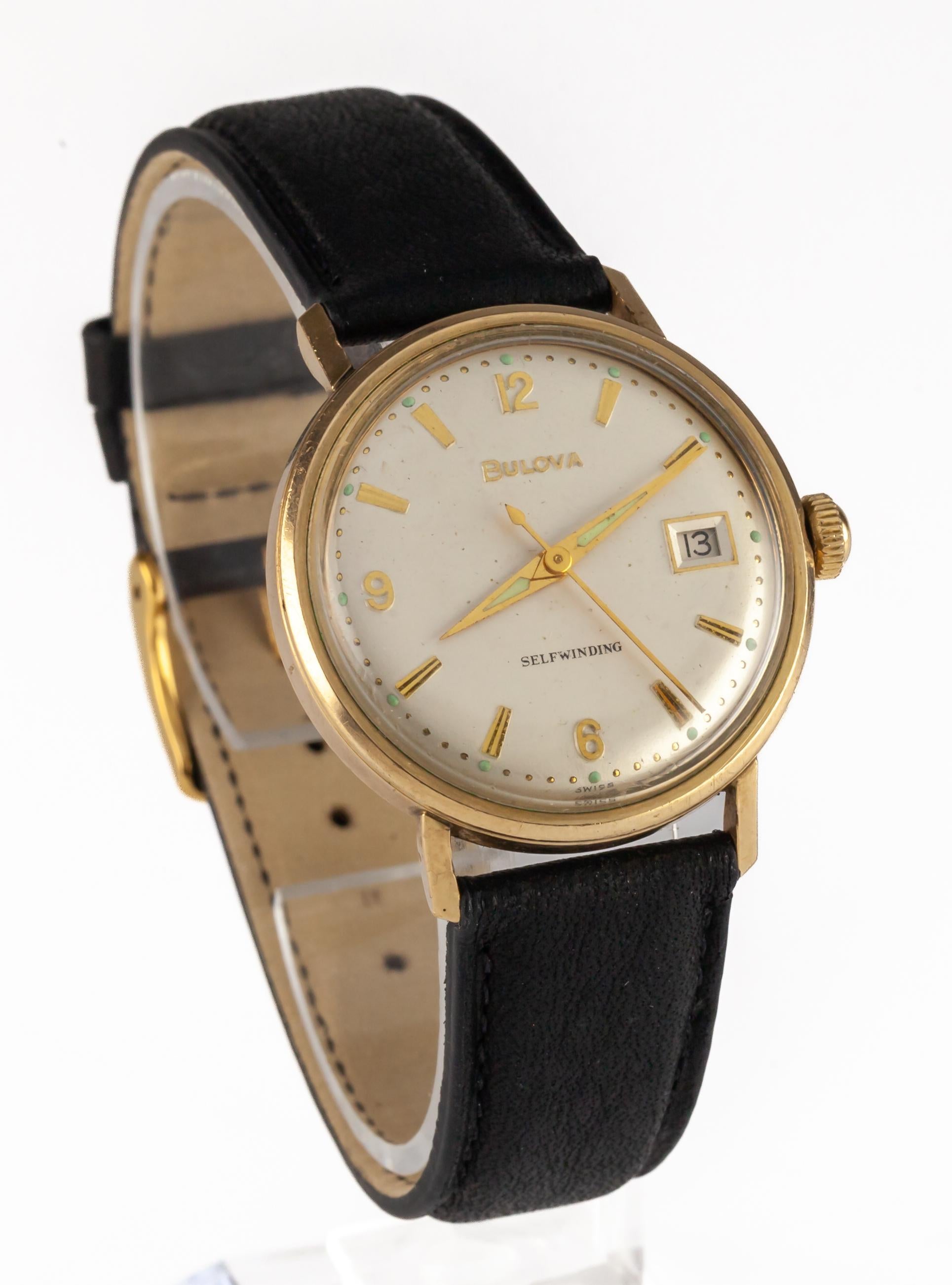 Bulova 10k Yellow Gold Filled Self-Winding Men's Watch w/ Date K21181

Case #21181
Self-Winding Automatic Movement

10k Gold Filled Round Case
32 mm in Diameter (35 mm w/ Crown)
Lug-to-Lug Distance = 39 mm
Lug-to-Lug Width = 18 mm

Champange Dial w/