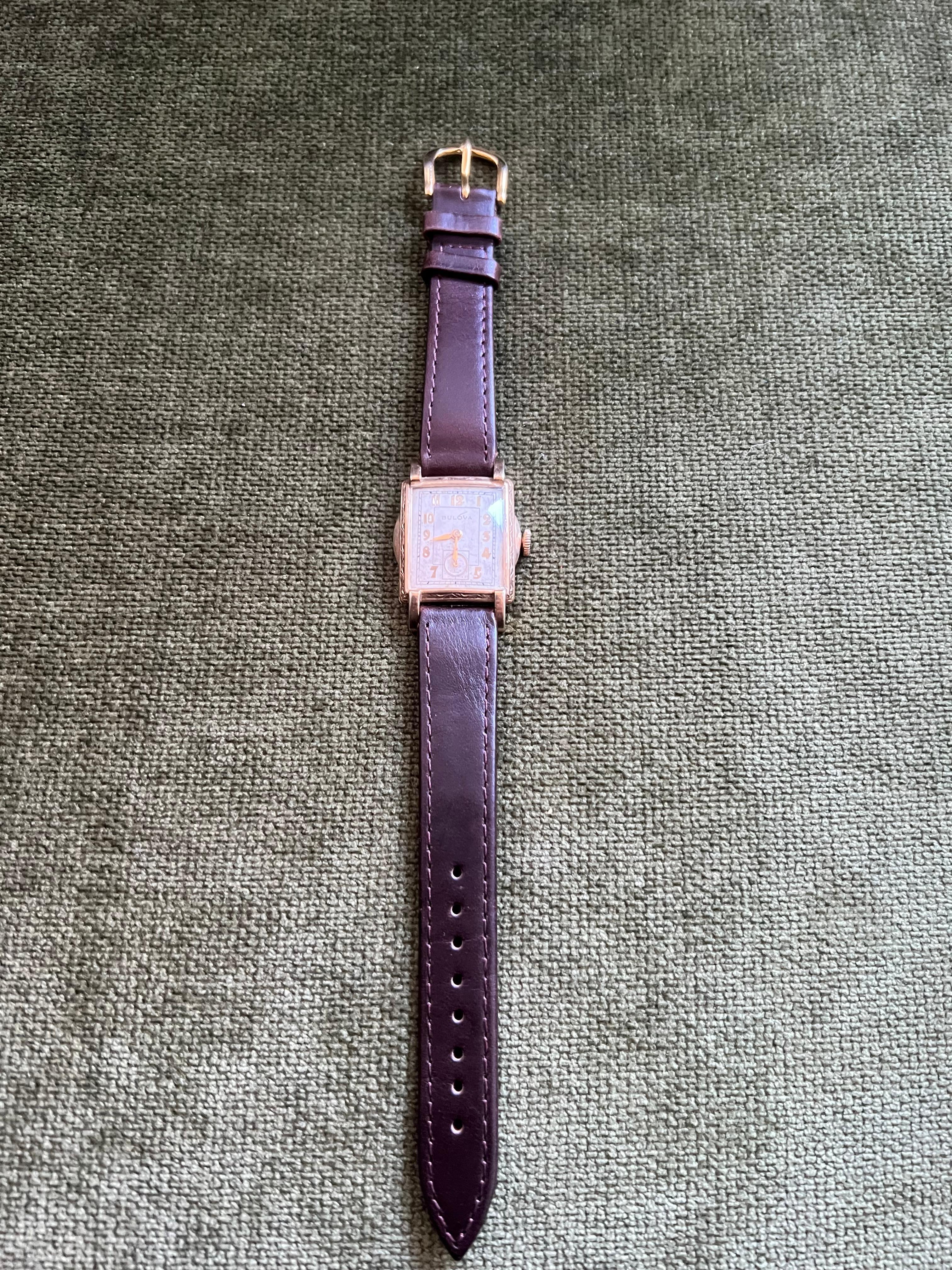 Bulova 2 dial Watch In 10k Gold With New Brown Lather Strap Circa 1940s
stylish art Deco and unusual gents manual wrist watch dating to 1940s, Bulova Ranger in gold, serviced with new mainspring, crystal and strap. Running beautifully
Size: 25mm x