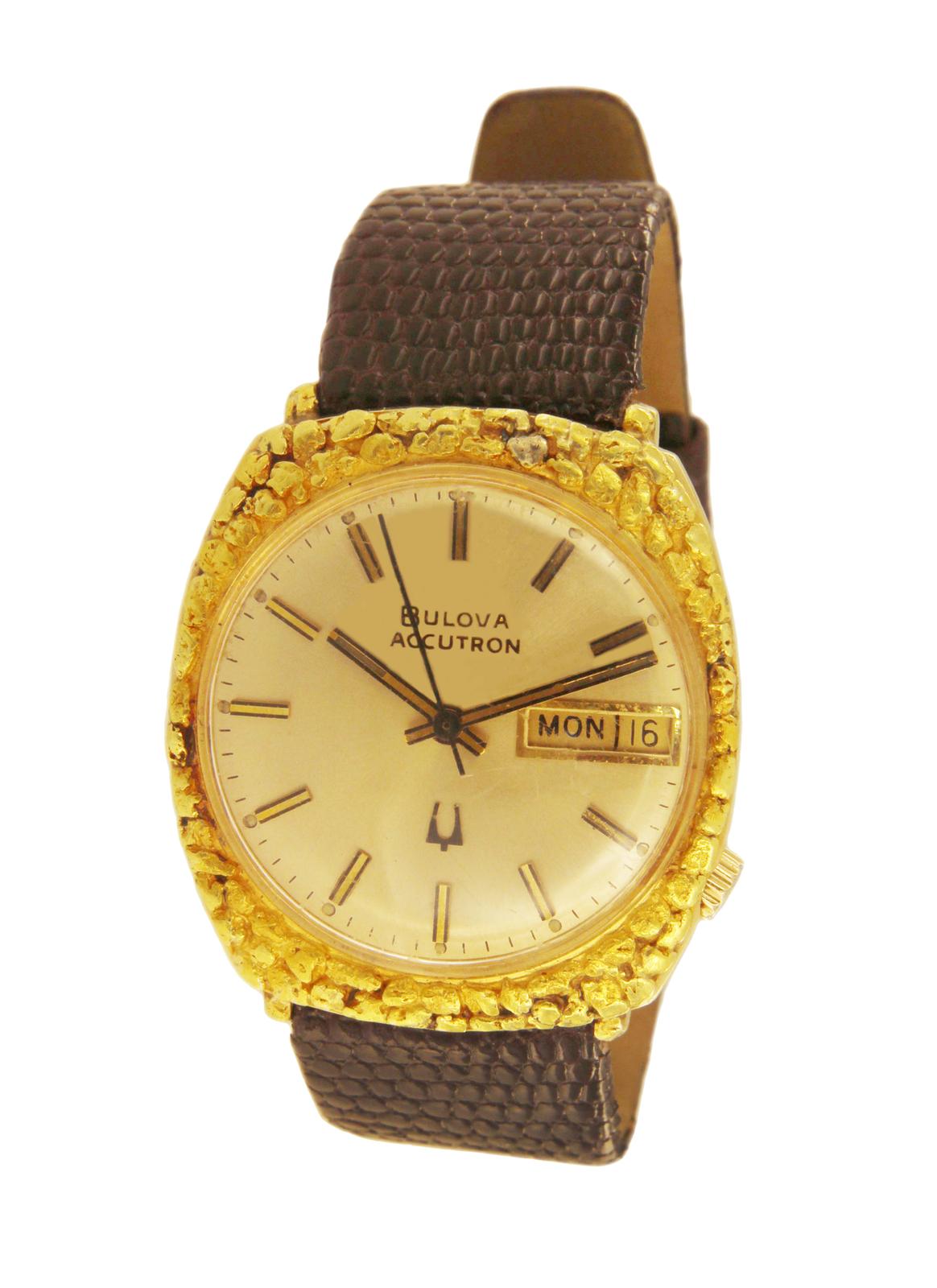 bulova accutron 14k gold watch value