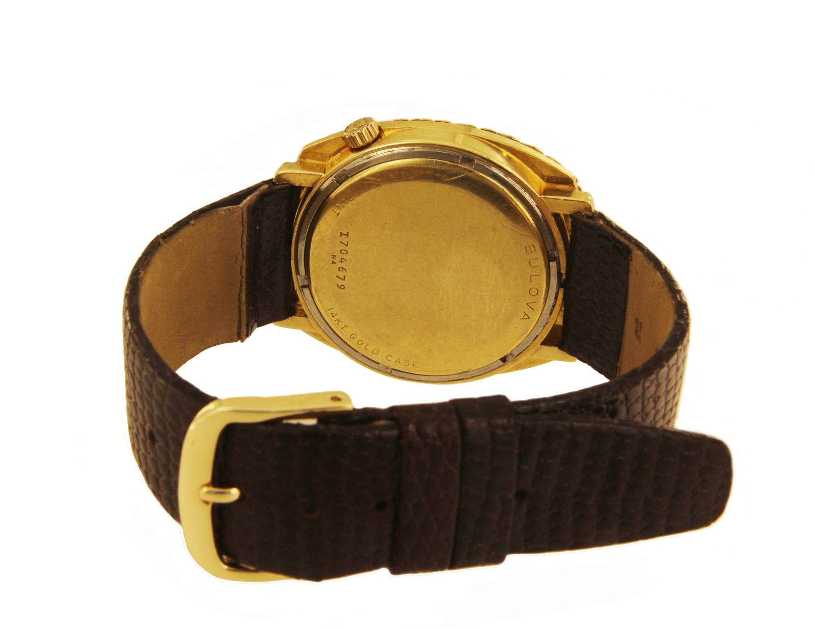 vintage bulova accutron 14k gold watch