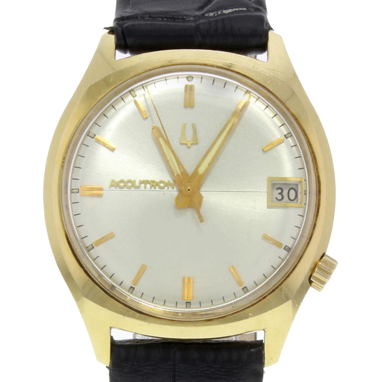 (18701)
This pre-owned Bulova Accutron N/A is a beautiful men's timepiece that is powered by a quartz movement which is cased in a yellow gold case. It has a round shape face, date dial and has hand sticks style markers. It is completed with a