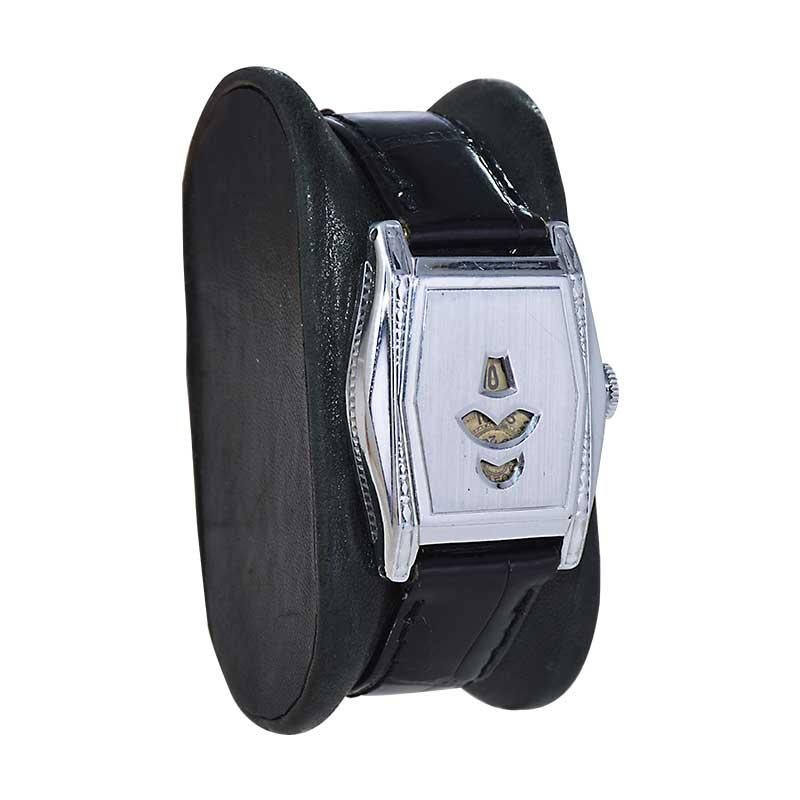 FACTORY / HOUSE: Bulova Watch Company
STYLE / REFERENCE: Art Deco Digital Tonneau Shape
METAL / MATERIAL: Chromium
CIRCA / YEAR: 1930's
DIMENSIONS / SIZE: 27mm X 36mm
MOVEMENT / CALIBER: Manual Winding / 17 Jewels / Caliber 10AT
DIAL / HANDS: