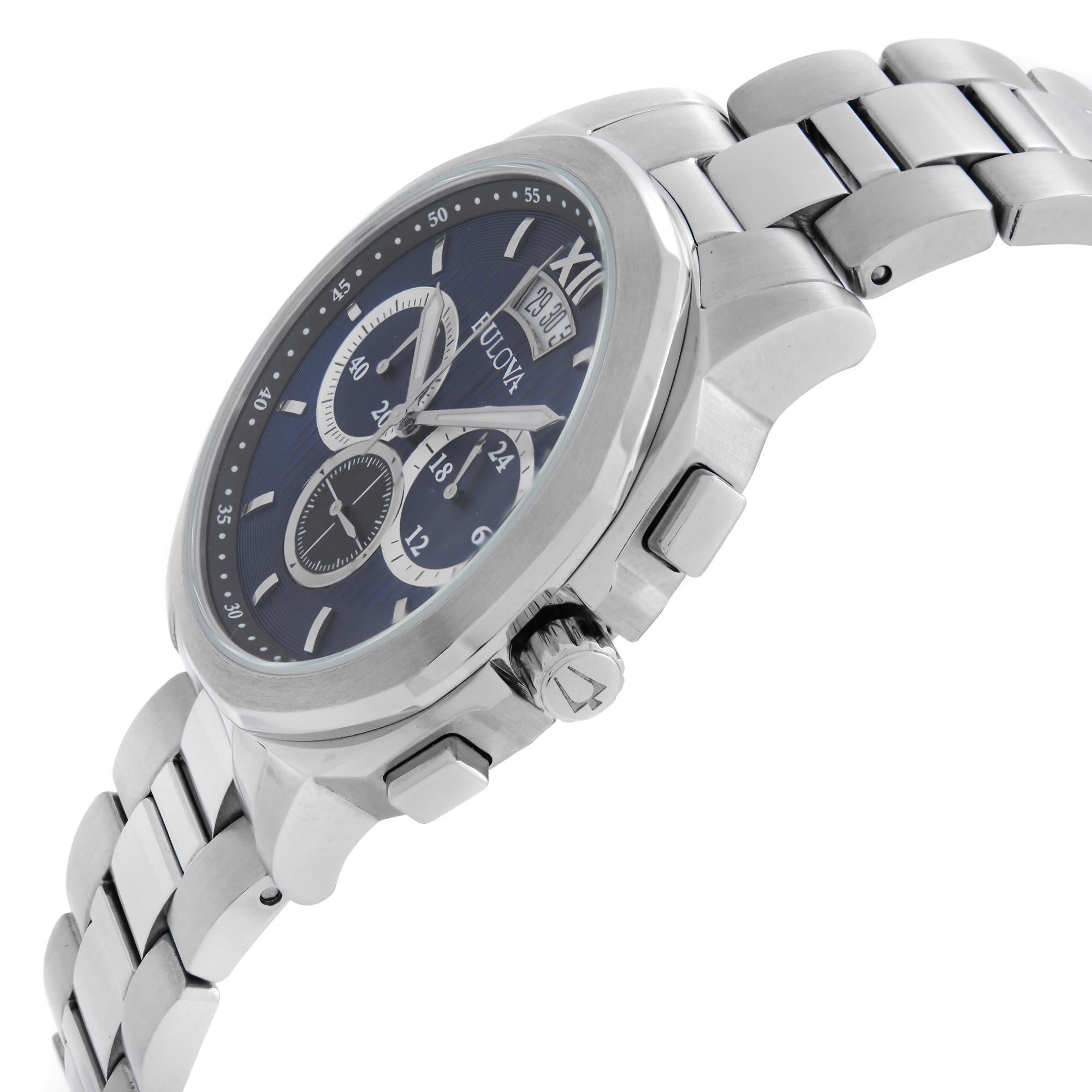Display Model Bulova Classic 96B219. This Beautiful Timepiece is Powered by a Quartz (Battery) Movement and Features: Stainless Steel Case and Bracelet. Blue Dial with Luminous Silver-Tone Hands and Index Hour Markers. Roman Numeral appears at the