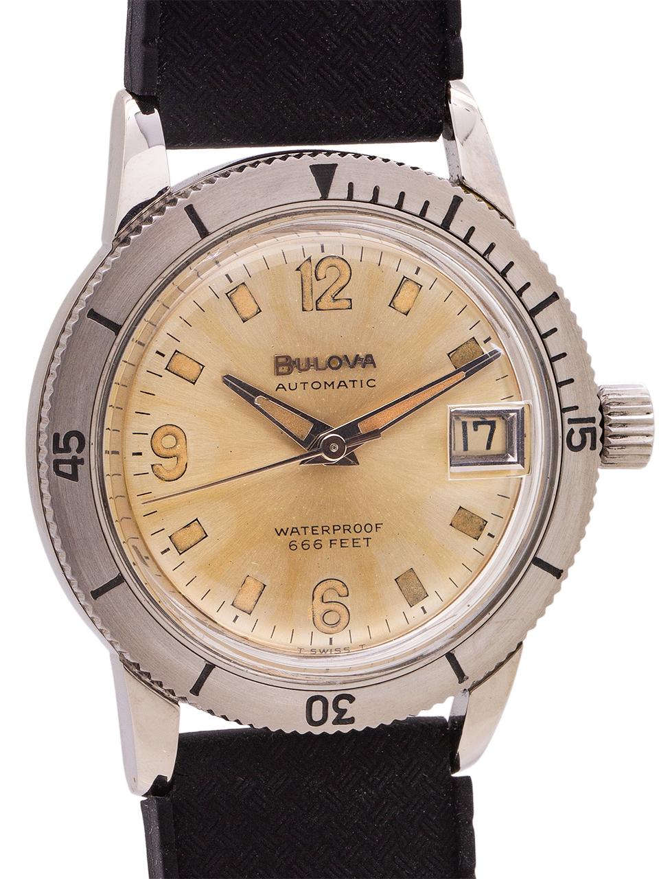 
Bulova stainless steel Diver’s circa 1960. 34mm diameter case with rotating elapsed time bezel. Original matte silver dial with patina’d luminous indexes in a mixture of sticks and arabic numerals, with matching hands. Dial also features a raised