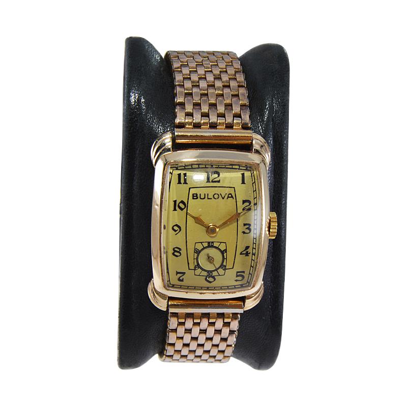FACTORY / HOUSE: Bulova Watch Company
STYLE / REFERENCE: Art Deco / Tonneau Shape
METAL / MATERIAL: Yellow Gold Filled
CIRCA / YEAR: 1940's
DIMENSIONS / SIZE: Length 34mm x Width 22mm
MOVEMENT / CALIBER: Manual Winding / 17 Jewels / Cal.8AH
DIAL /