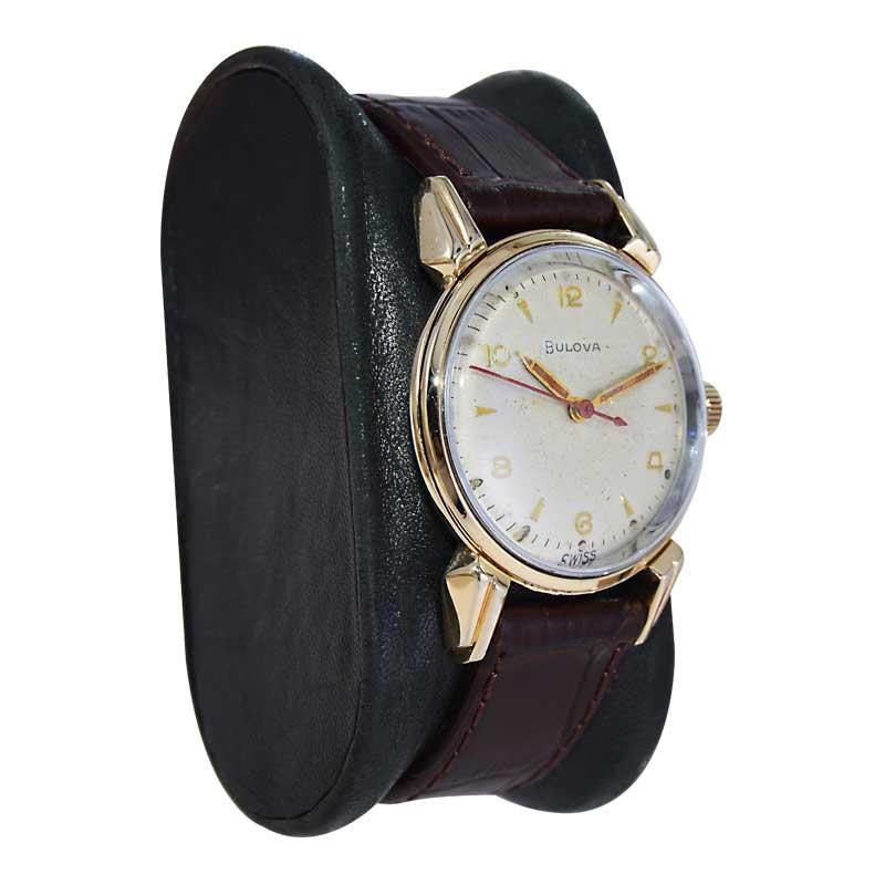 FACTORY / HOUSE: Bulova Watch Company
STYLE / REFERENCE: Art Deco 
METAL / MATERIAL: Yellow Gold Filled 
CIRCA / YEAR: 1950's
DIMENSIONS / SIZE: Length 41mm X Diameter 31mm
MOVEMENT / CALIBER: Manual Winding / 17 Jewels 
DIAL / HANDS: Original