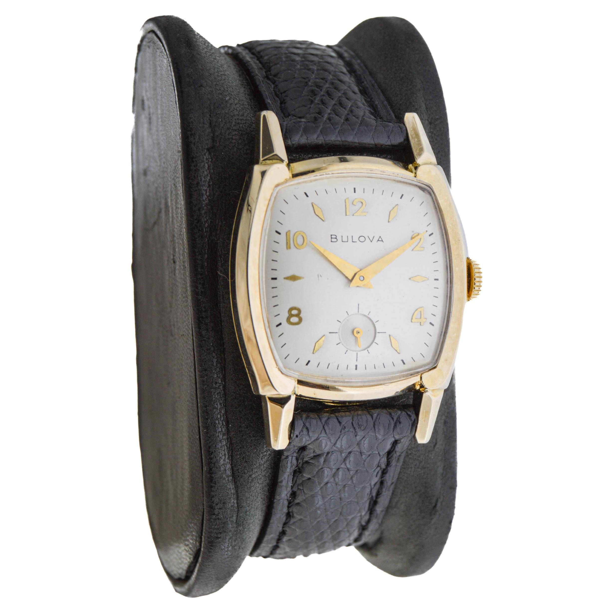 FACTORY / HOUSE: Bulova Watch Company
STYLE / REFERENCE: Art Deco / Tortue Shape
METAL / MATERIAL: Yellow Gold-Filled
CIRCA / YEAR: 1940's
DIMENSIONS / SIZE: Length 38mm X Width 27mm
MOVEMENT / CALIBER: Manual Winding / 21 Jewels / Caliber 10BM
DIAL