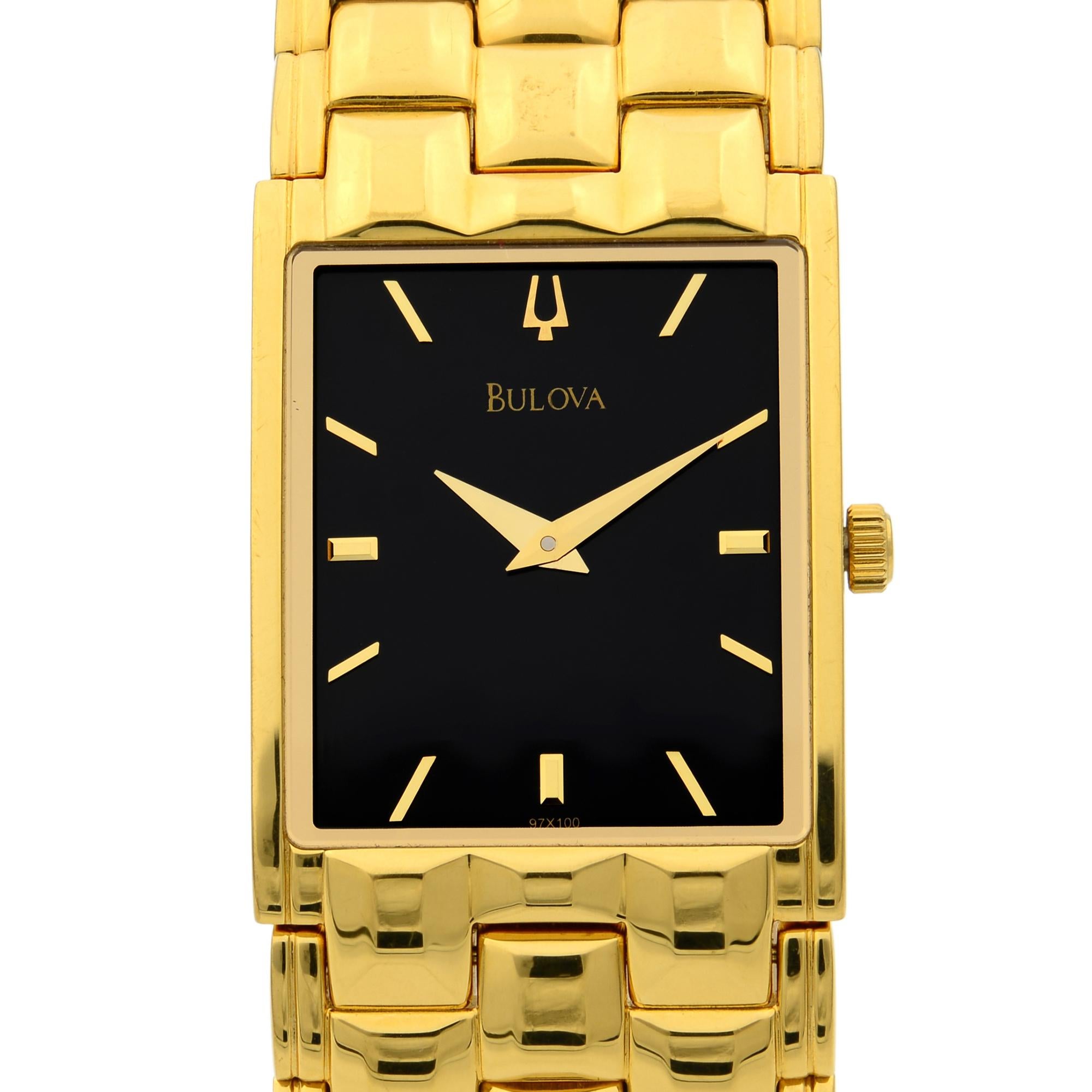 This pre-owned Bulova 97X100 Watch is a beautiful men's timepiece that is powered by quartz (battery) movement which is cased in a stainless steel case. It has a rectangle shape face and has hand sticks style markers. It is completed with a