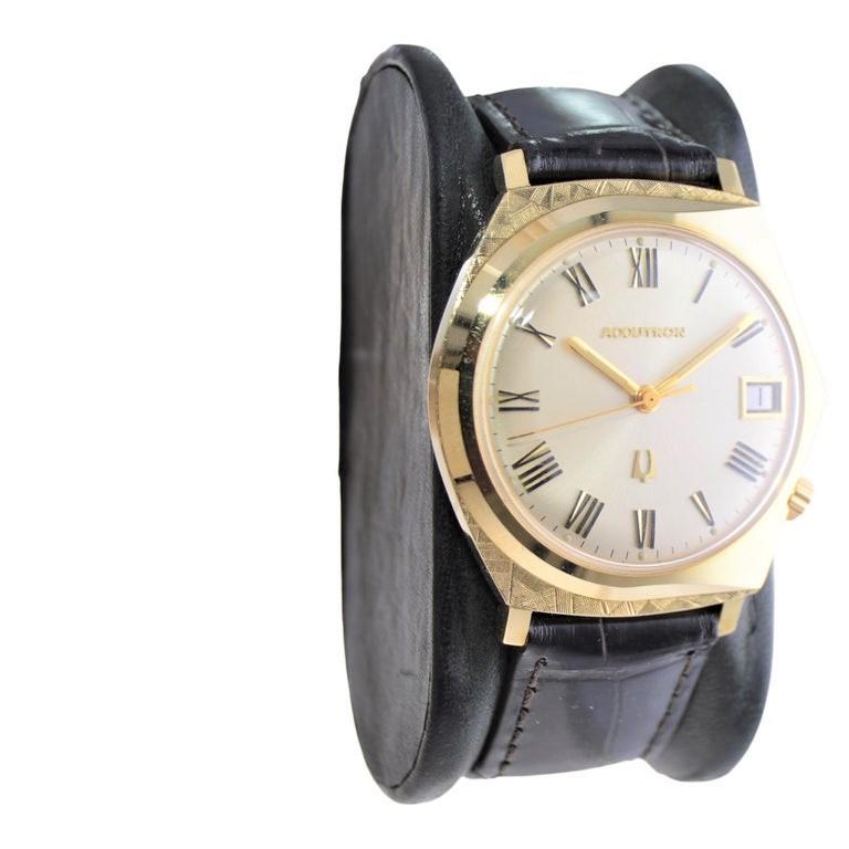 FACTORY / HOUSE: Accutron, by Bulova 
STYLE / REFERENCE: Asymmetrical  / M9
METAL / MATERIAL: 14Kt. Solid Gold
DIMENSIONS: Length 42mm  X Diameter 35mm
CIRCA: 1960's
MOVEMENT / CALIBER: Electric / Battery 
DIAL / HANDS: Original Silvered Roman /