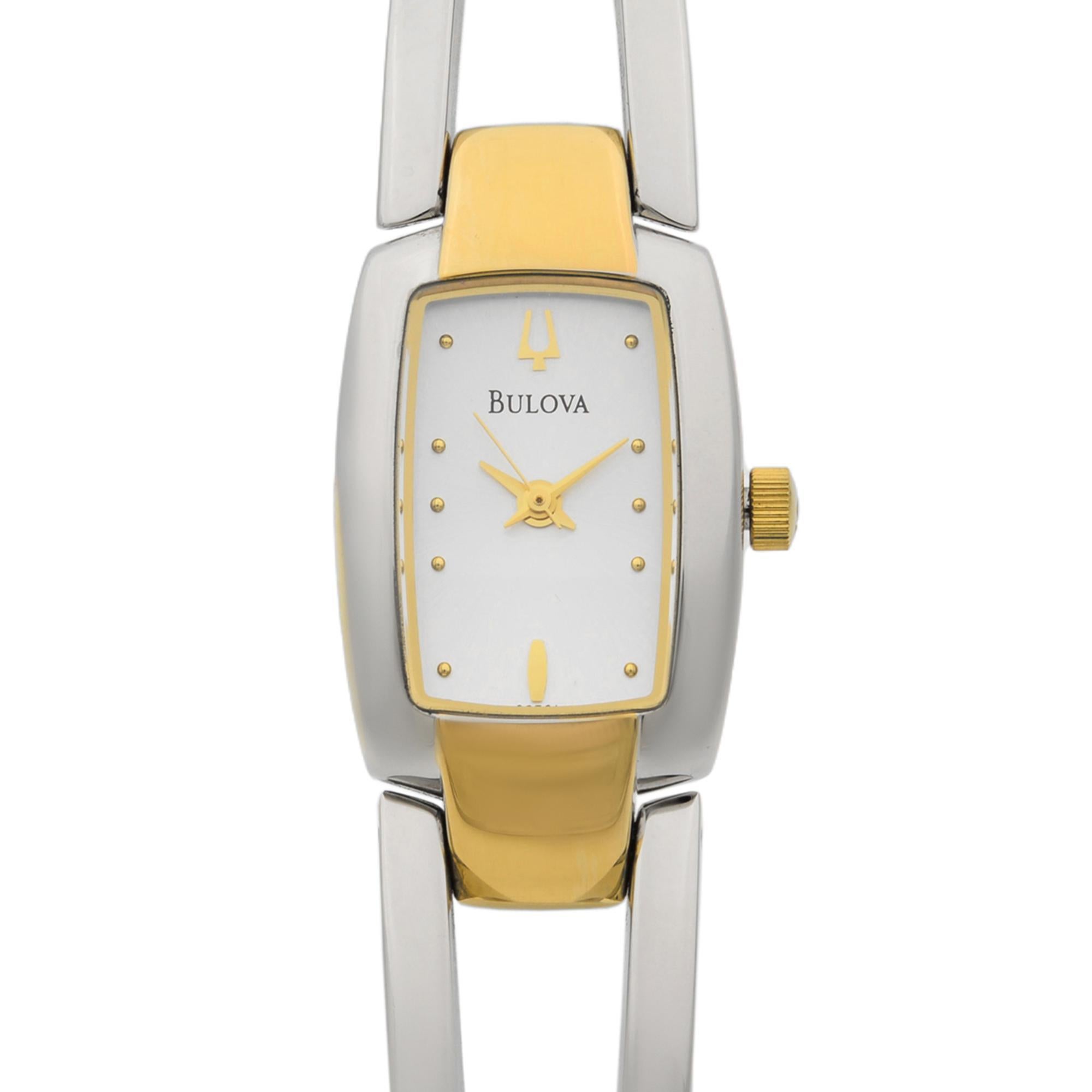 This pre-owned Bulova Silver Dots Dial Two Tone Steel Quartz Ladies Bangle Watch 98T81. Show Micro Scratches on the Gold-Tone Part of the Bracelet. this Beautiful Ladies Timepiece is Powered by Quartz (Battery) Movement which is Cased in a Stainless