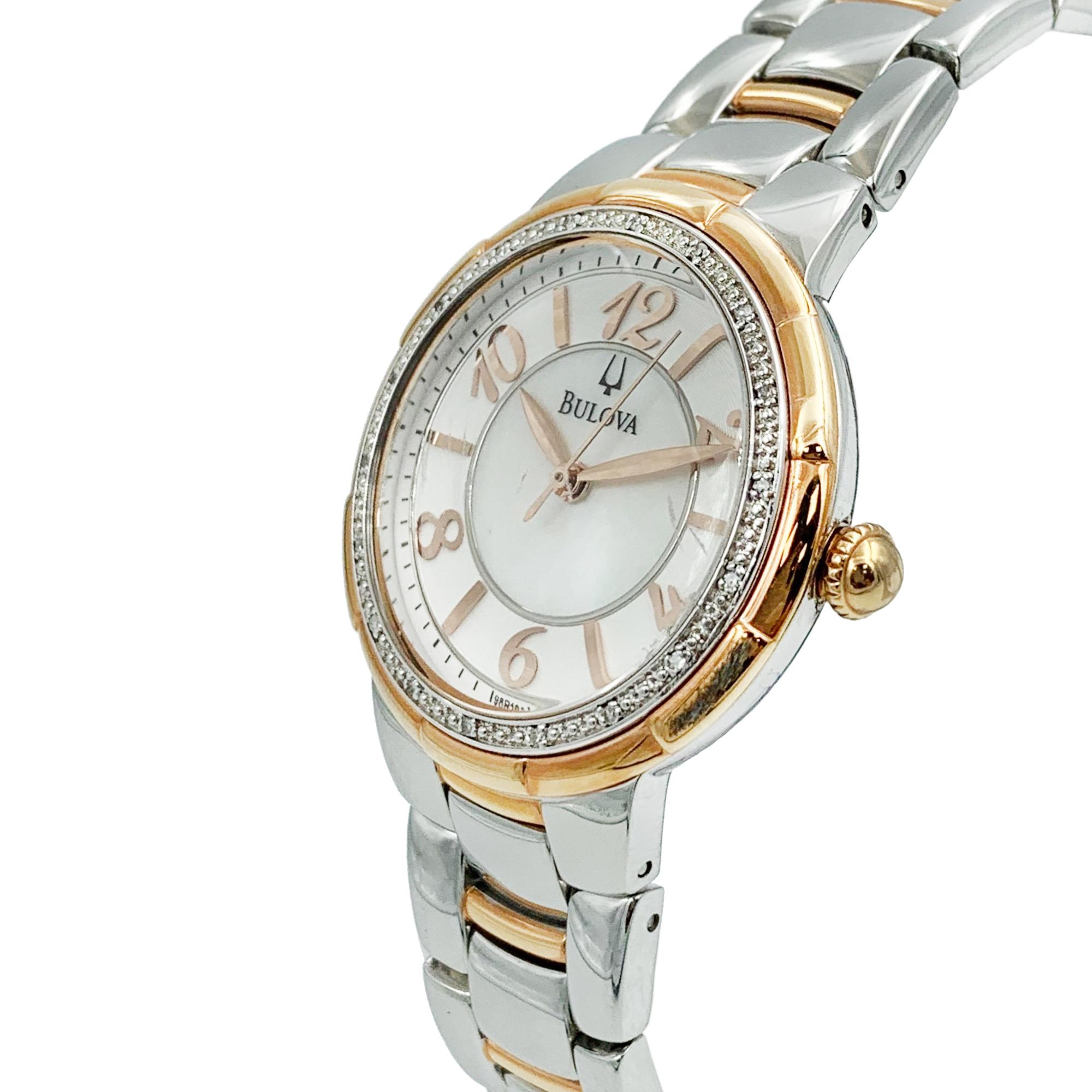 Pre-owed Bulova Diamond Bezel Stainless Steel Quartz Womens Watch 98R162. Watch has visible Discoloration and Scratches on Bezel and Bracelet From Handling. This Timepiece is Powered by a Quartz Movement and Features: Stainless Steel Case with a