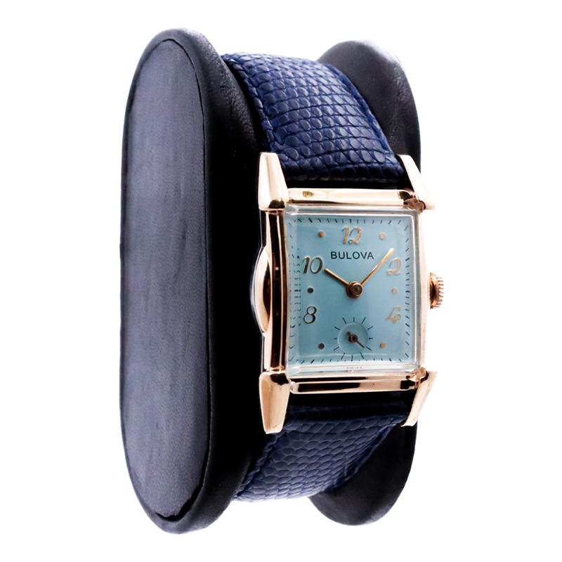FACTORY / HOUSE: Bulova Watch Company
STYLE / REFERENCE: Art Deco / Tank Style
METAL / MATERIAL: Yellow Gold Filled
CIRCA / YEAR: 1940's
DIMENSIONS / SIZE:  Length 36mm X Width 25mm
MOVEMENT / CALIBER: Manual Winding / 17 Jewels / Caliber 10BT 
DIAL