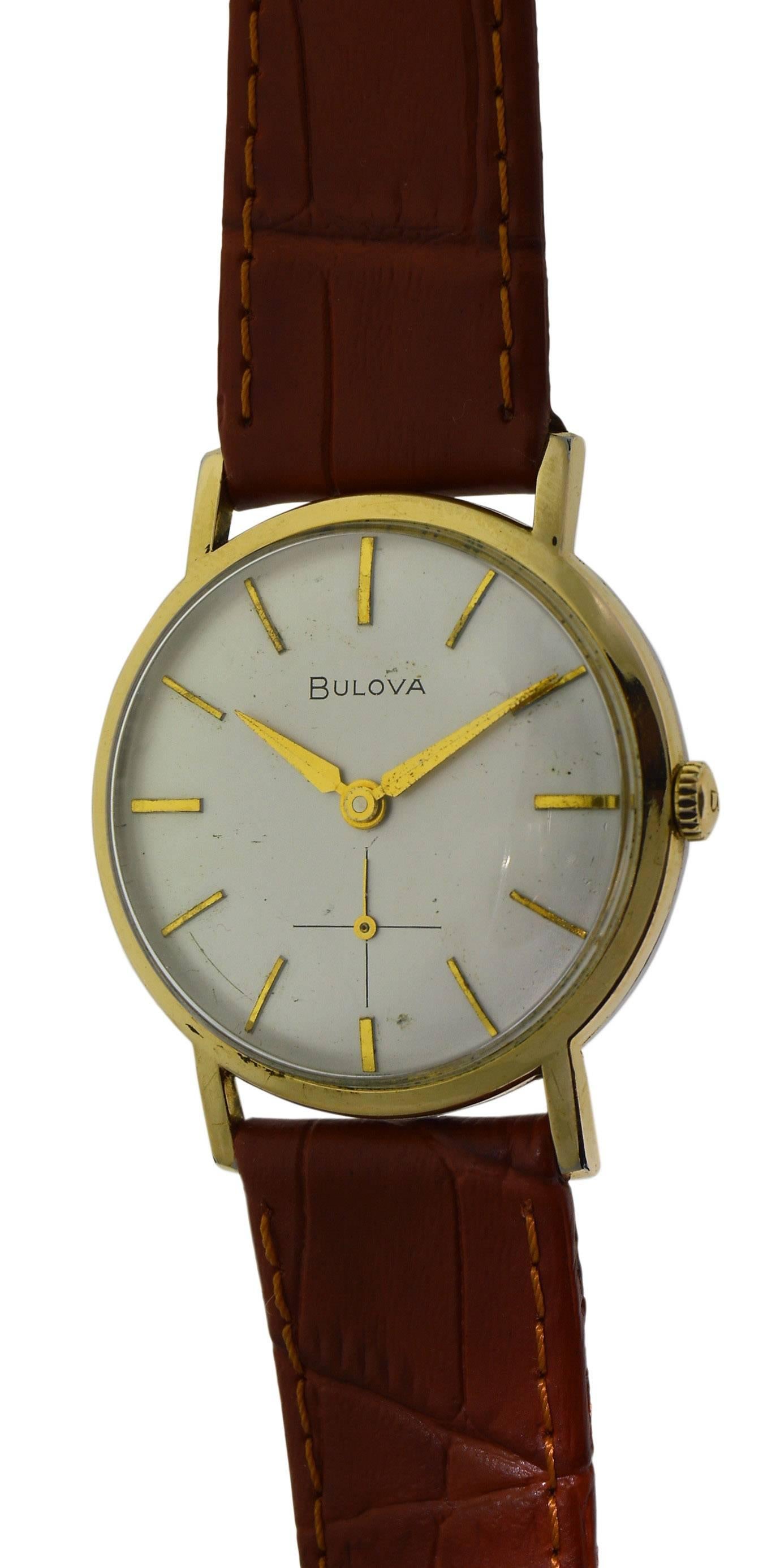 FACTORY / HOUSE: Bulova Watch Company
STYLE / REFERENCE: Round / Classical
METAL / MATERIAL: Yellow Gold Filled
CIRCA: 1960's
DIMENSIONS: 38mm X 32mm
MOVEMENT / CALIBER: Manual Winding / 17 Jewels 
DIAL / HANDS: Original Silvered with Baton Markers