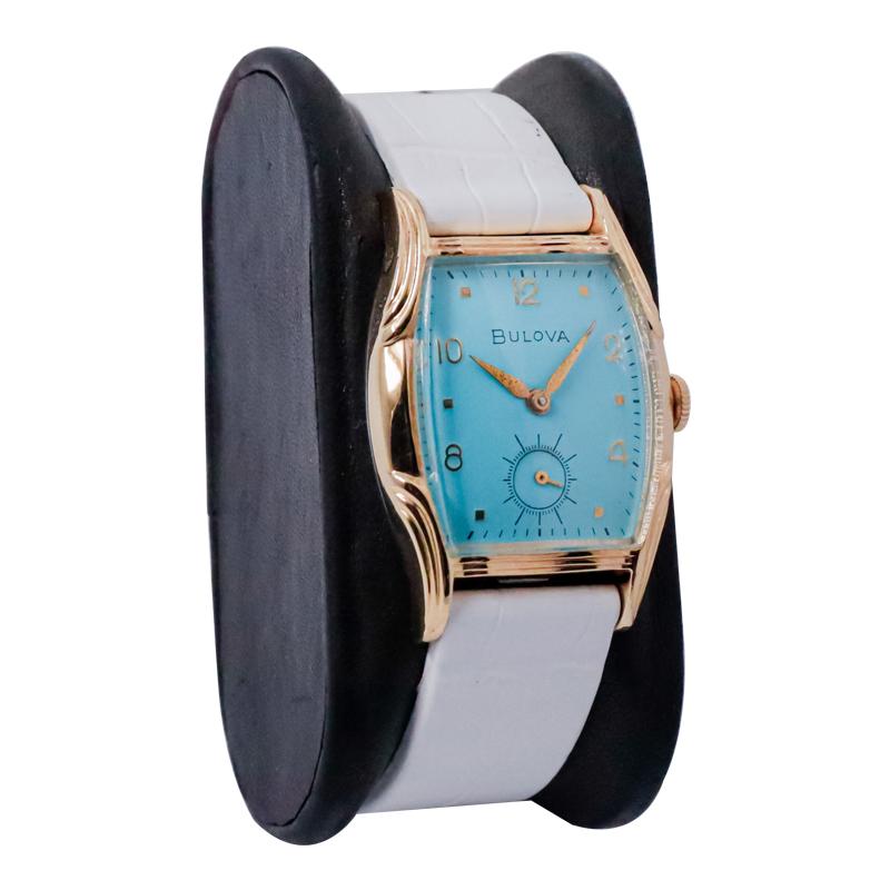 FACTORY / HOUSE: Bulova Watch Company
STYLE / REFERENCE: Art Deco / Tortue (Tortoise) Shaped
METAL / MATERIAL: Yellow Gold Filled
CIRCA / YEAR: 1950's
DIMENSIONS / SIZE:  Length 40mm X Width 33mm
MOVEMENT / CALIBER: Manual Winding / 17 Jewels /