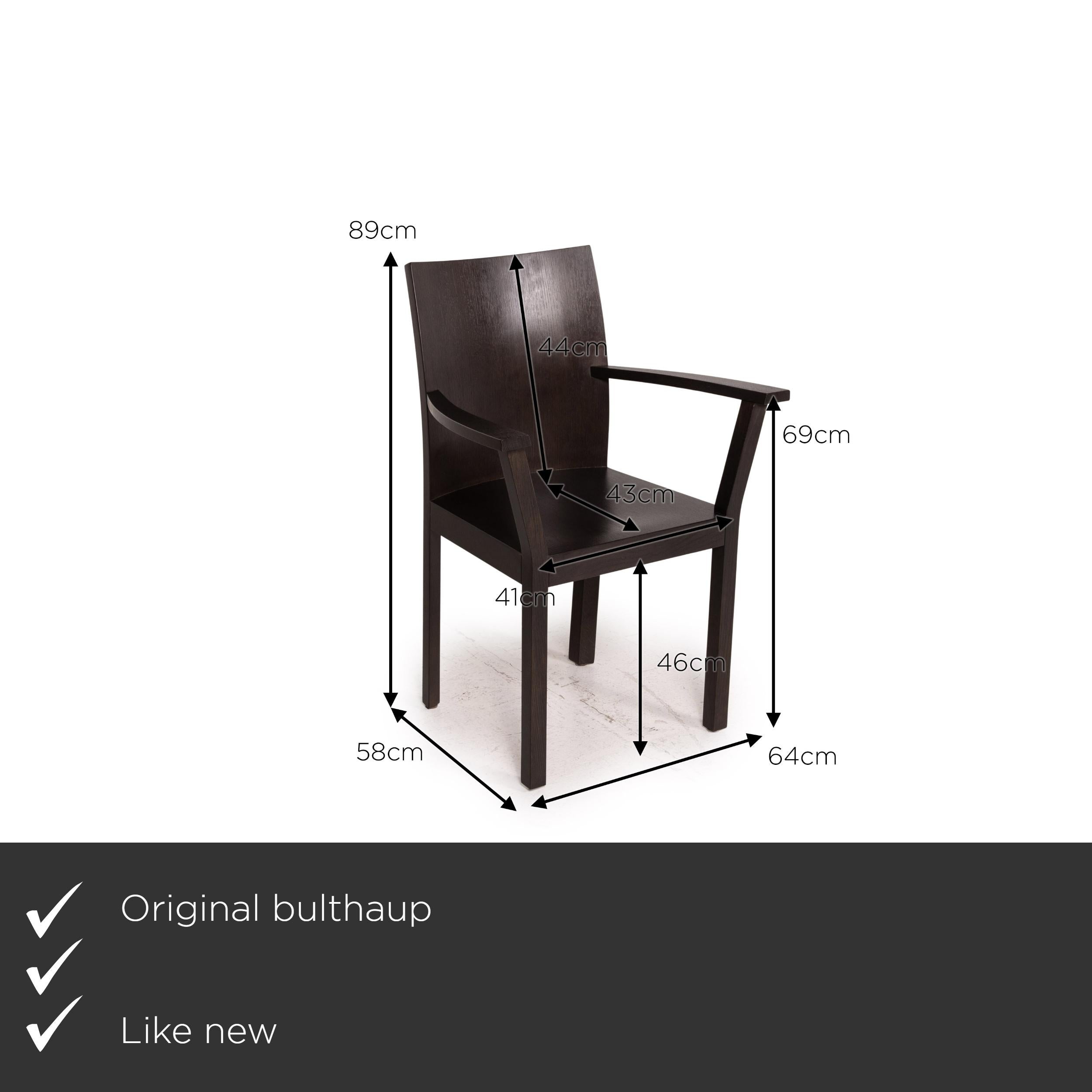 We present to you a bulthaup nemus wood chair dark brown brown.

Product measurements in centimeters:

Depth 58
Width 64
Height 89
Seat height 46
Rest height 69
Seat depth 43
Seat width 41
Back height 44.
 
  
  
