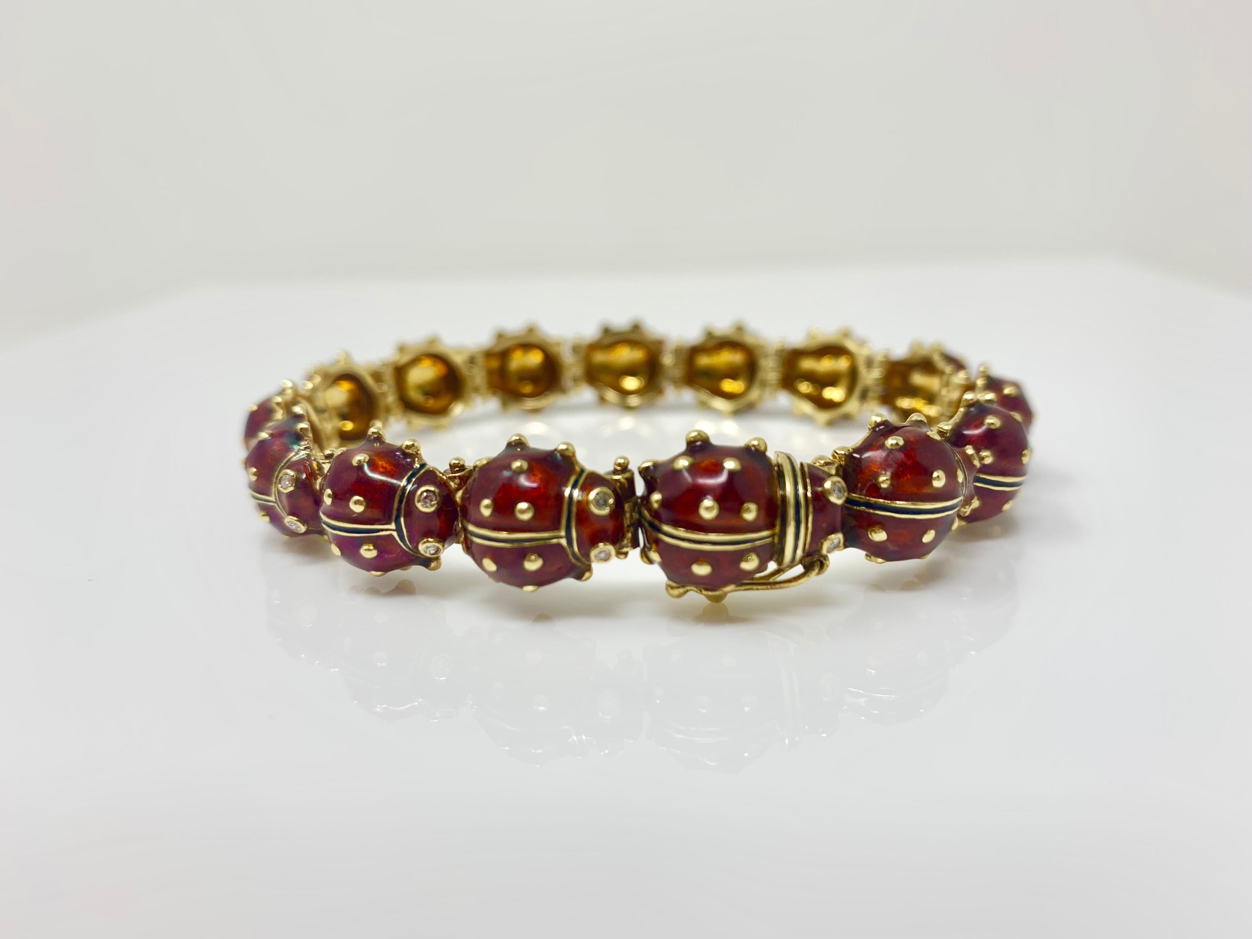 This exclusive Lady bug diamond, enamel and yellow gold bracelet is unique and beautifully handcrafted in 18k yellow gold. 
Diamond weight : 0.55 carat 
Metal : 18K yellow gold 
Measurement : 7 1/2 inches