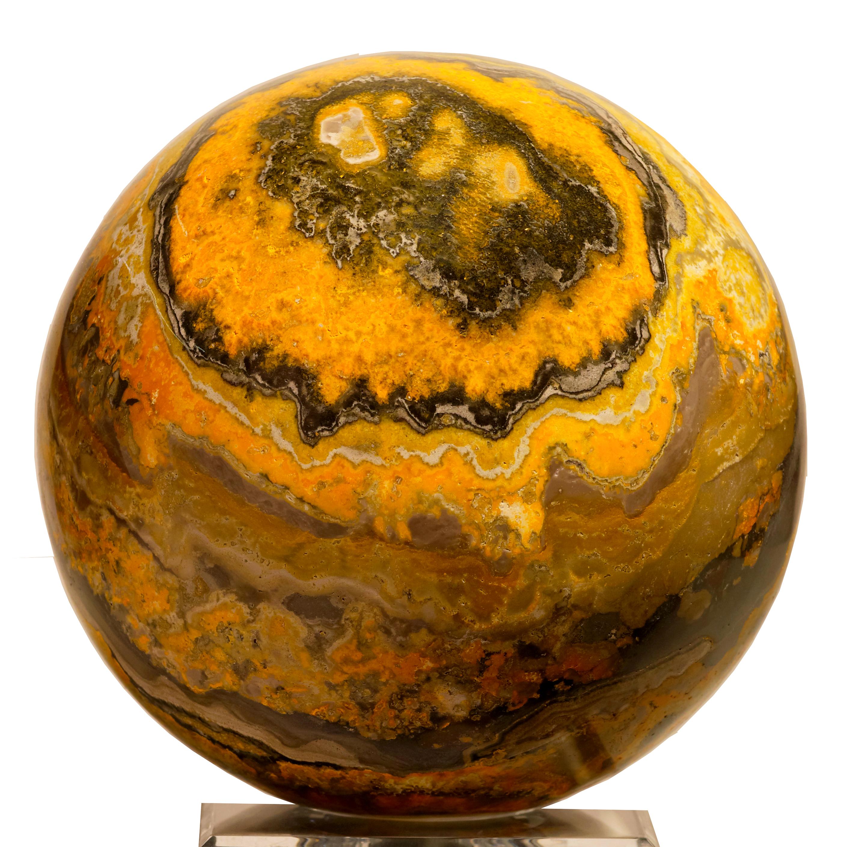 Decorative  Rare type of  Large sphere of Bumblebee Jasper stone. 
Actuallynot a jasper but a mixture of orpiment calcite and opal.  Indonesia

Welcome positive energy into one's interior with this massive and spectacular mounted fluorite slice with