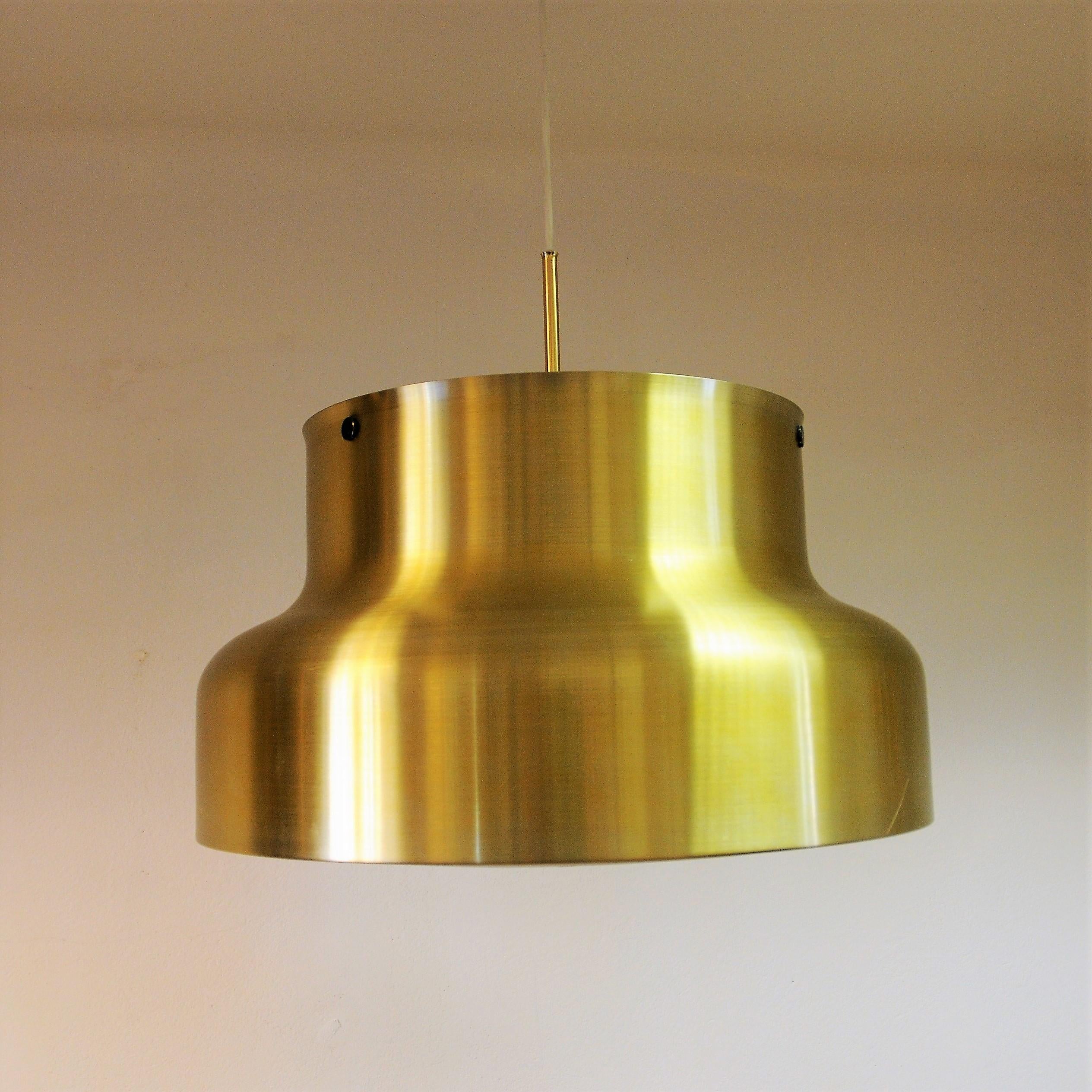 Big and beautiful Ceiling lamp ”Bumlingen” in polished brass by Anders Pehrson for Atelje Lyktan, 1960s Sweden. This is the larges Bumlingen made by Pehrson and it was produced untill the 1970s. White plastic grid inside and whitepainted metal.