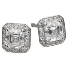 BUNDA Boucles d'oreilles en platine avec 1,19cts de diamants.