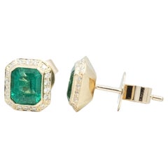 BUNDA Ohrringe aus 18 Karat Gelbgold mit 1,85 Karat Smaragden und 0,18 Karat Diamanten