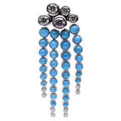 BUNDA, broche couture, en or 18 carats, turquoises de 3,80 carats et diamants de 1,31 carat