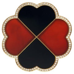 BUNDA Broche 'Couture' con Ónix, Cornalina y Diamante en Oro Amarillo de 18 ct