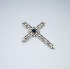 BUNDA Cross pendant with 1.84ct Sapphire and 2.73ct Diamonds in platinum