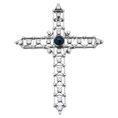 BUNDA Cross pendant with 1.84ct Sapphire and 2.73ct Diamonds in platinum