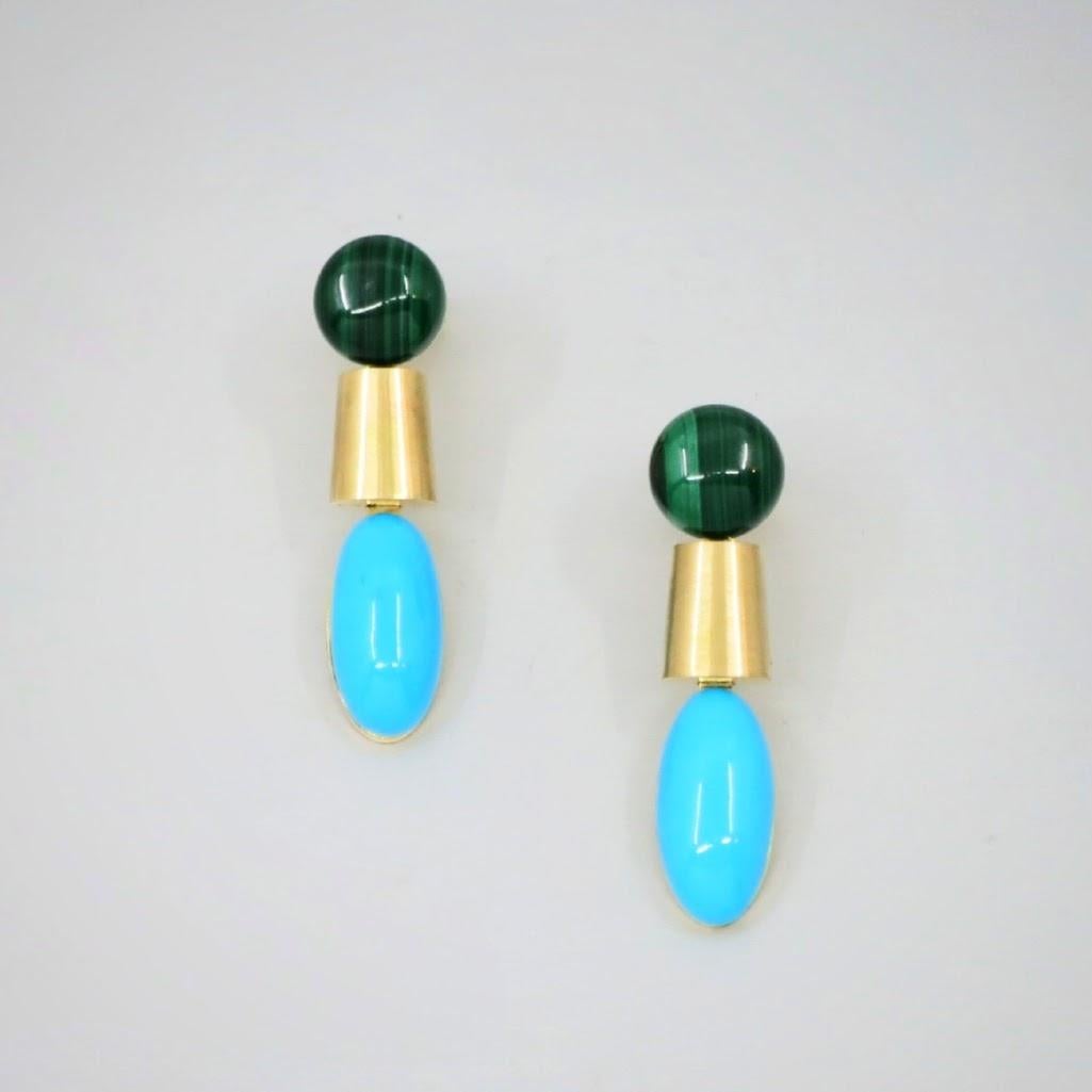 'Dorado' drop earrings set in 18 carat yellow gold with turquoise and malachite cabochons.

Characteristics of Blue Cabochon cut Turquoises; 2 = 10ct.

Characteristics of Green Cabochon cut Malachites; 2 = 10.71ct.

Total weight: 10.15 grams.