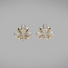 BUNDA Fleur de Lys 0.45ct Diamonds ear studs in 18k white and yellow gold.