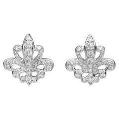 BUNDA Fleur de Lys 0.55ct Diamonds ear studs in 18k white gold.