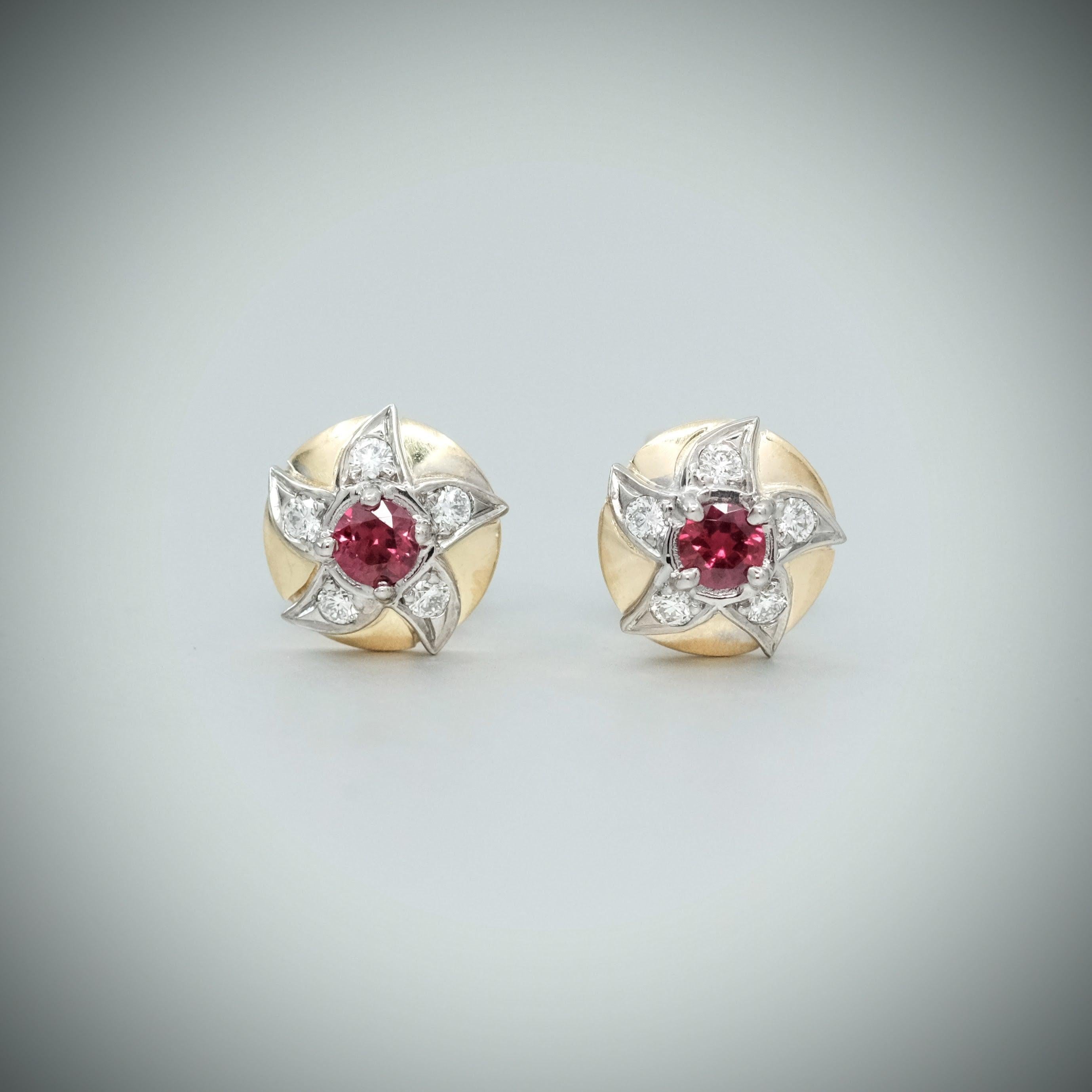 A BUNDA 'Lyra' pair of ruby and diamond earrings, set in 18ct yellow and white gold. Signed BUNDA.

Characteristics of Red Round Brilliant cut Rubys; 2 = 0.37ct.

Characteristics of Round Brilliant Cut Diamonds: 10 = 0.30ct, F colour, VS Clarity