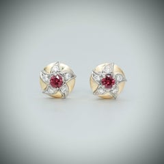 BUNDA Lyra Ohrringe aus 18 Karat Gold mit 0,37 Karat Rubinen und 0,30 Karat Diamanten