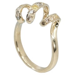Anillo BUNDA 'Lyra' de 0,60 ct de diamantes amarillos en oro amarillo de 18 quilates