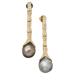 BUNDA Tahitian Pearls, diamonds and 18k yellow gold drop earrings.