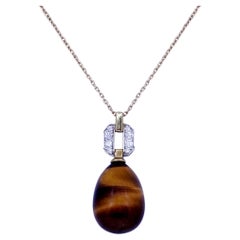 BUNDA Tiger's Eye and Diamond pendant on 18k yellow and white gold