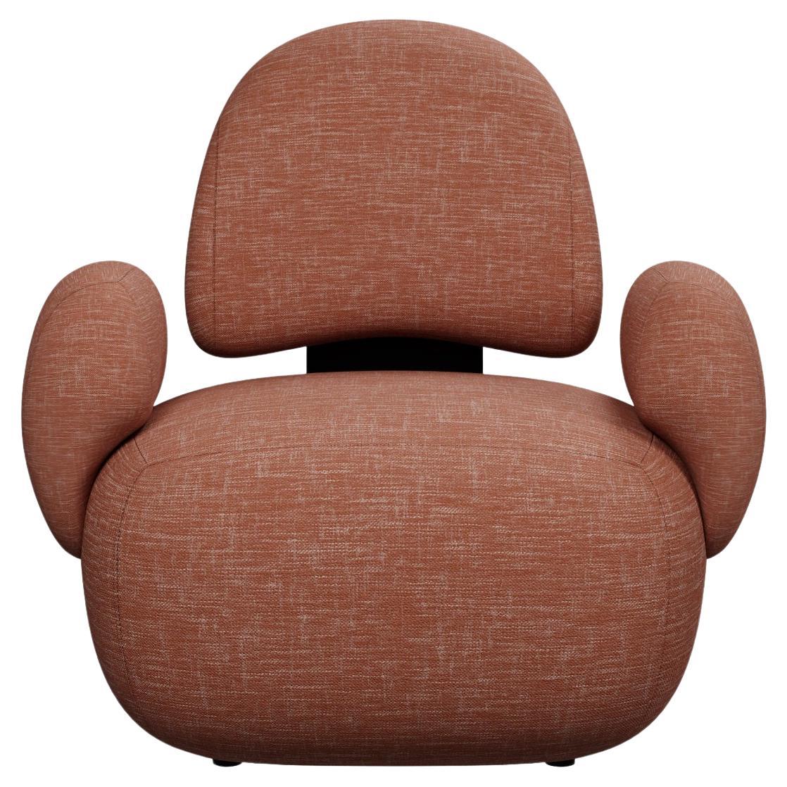 Bunny armchair in coral fabric handcrafted by Murmurio