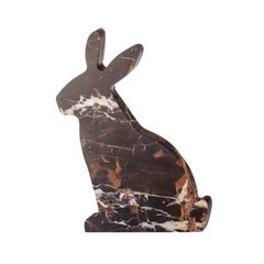 "Bunny" right bookend in Black & Gold marble in the shape of a rabbit