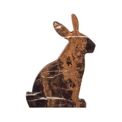 "Bunny" left bookend in Black & Gold marble in the shape of a rabbit